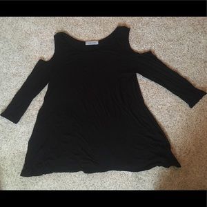 Black top with cutouts in the shoulders